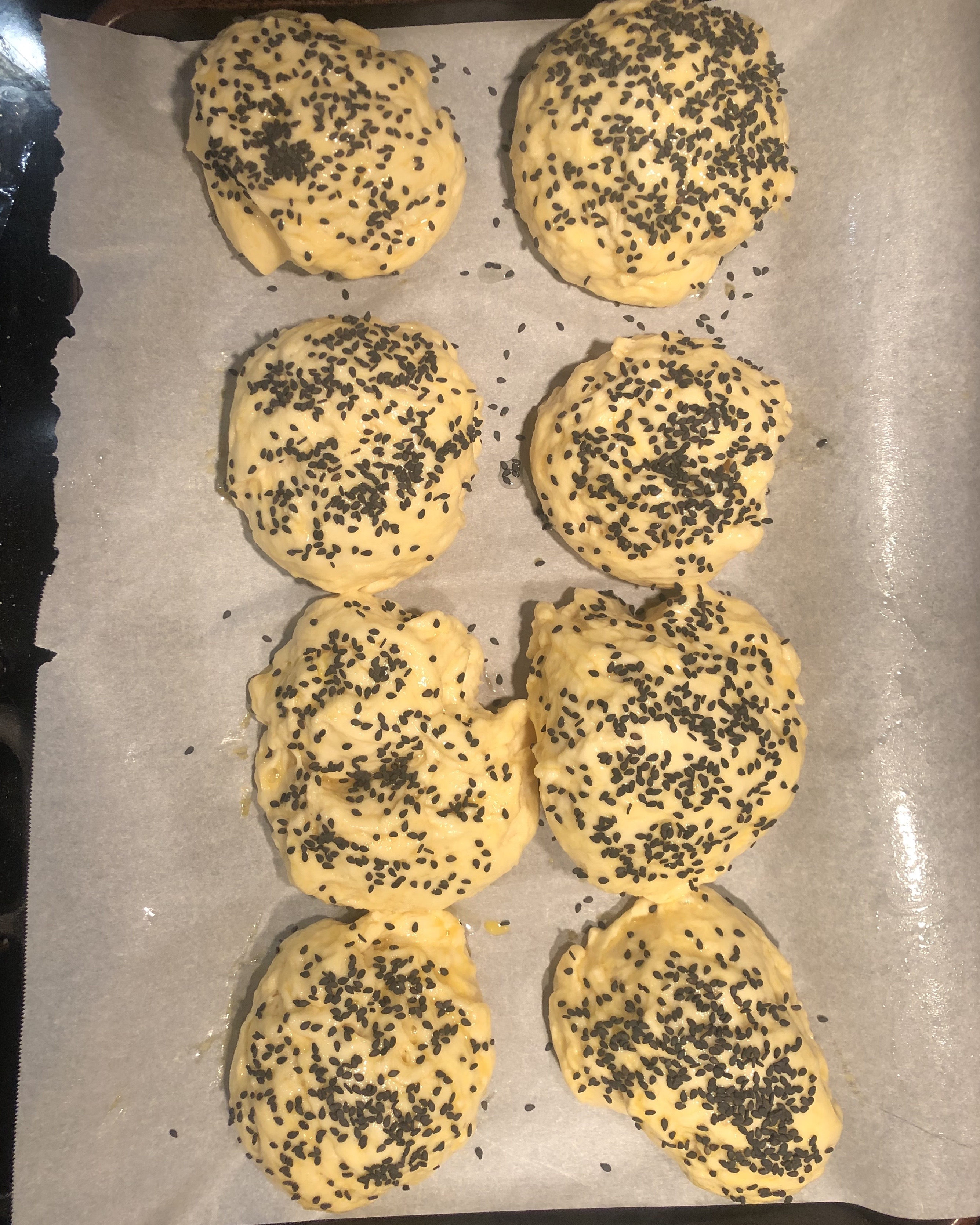 Brioche bun doughs with black sesame seeds