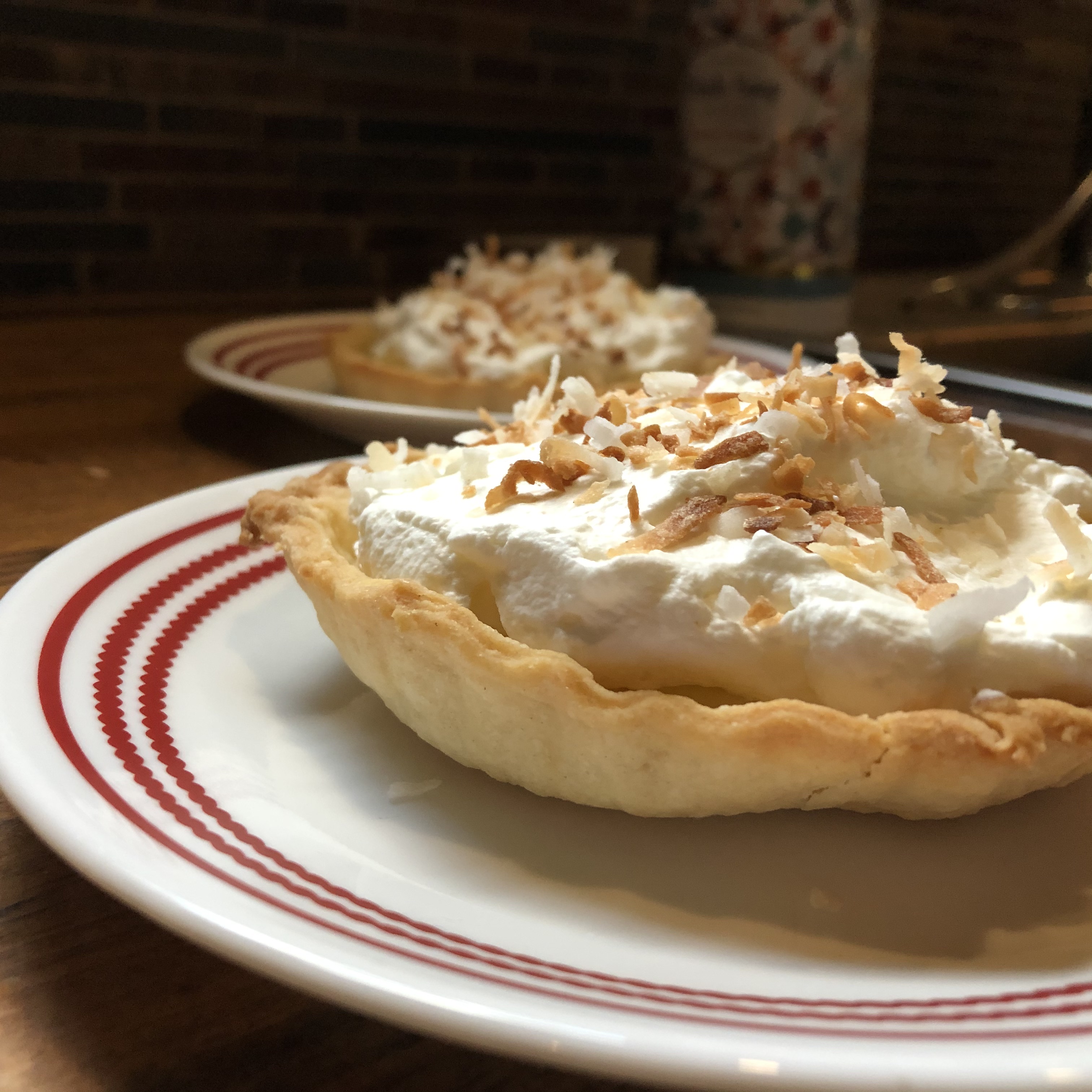 Mini coconut cream pie on plate