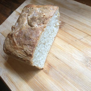 Part of a loaf of homemade bread, cut open